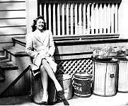 Mom with garbage cans.jpg